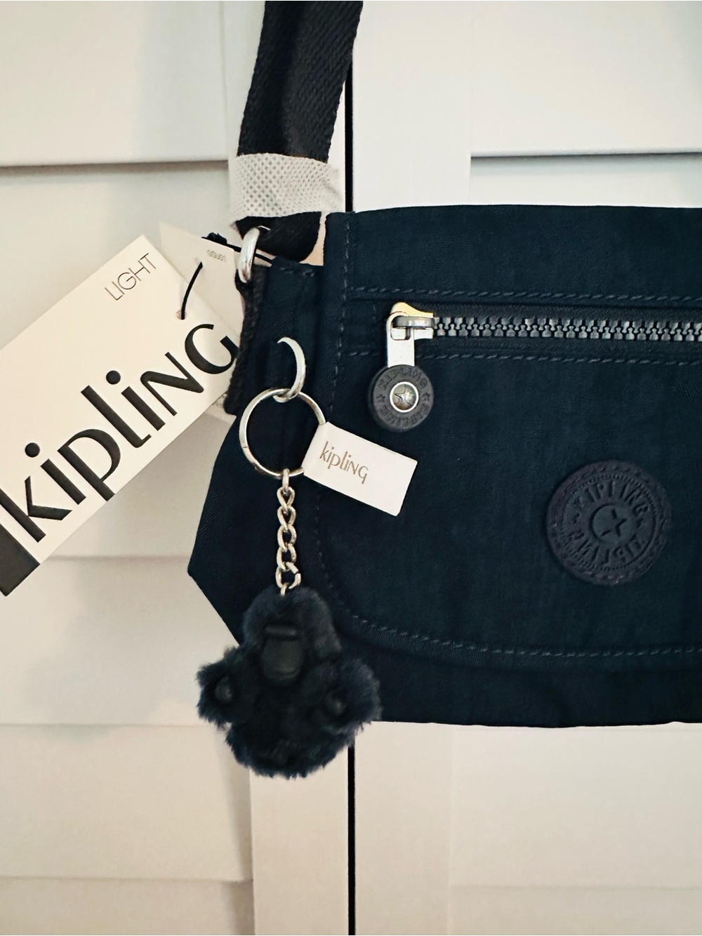 Kipling Black Crossbody Bag with Signature Pom-Pom Charm